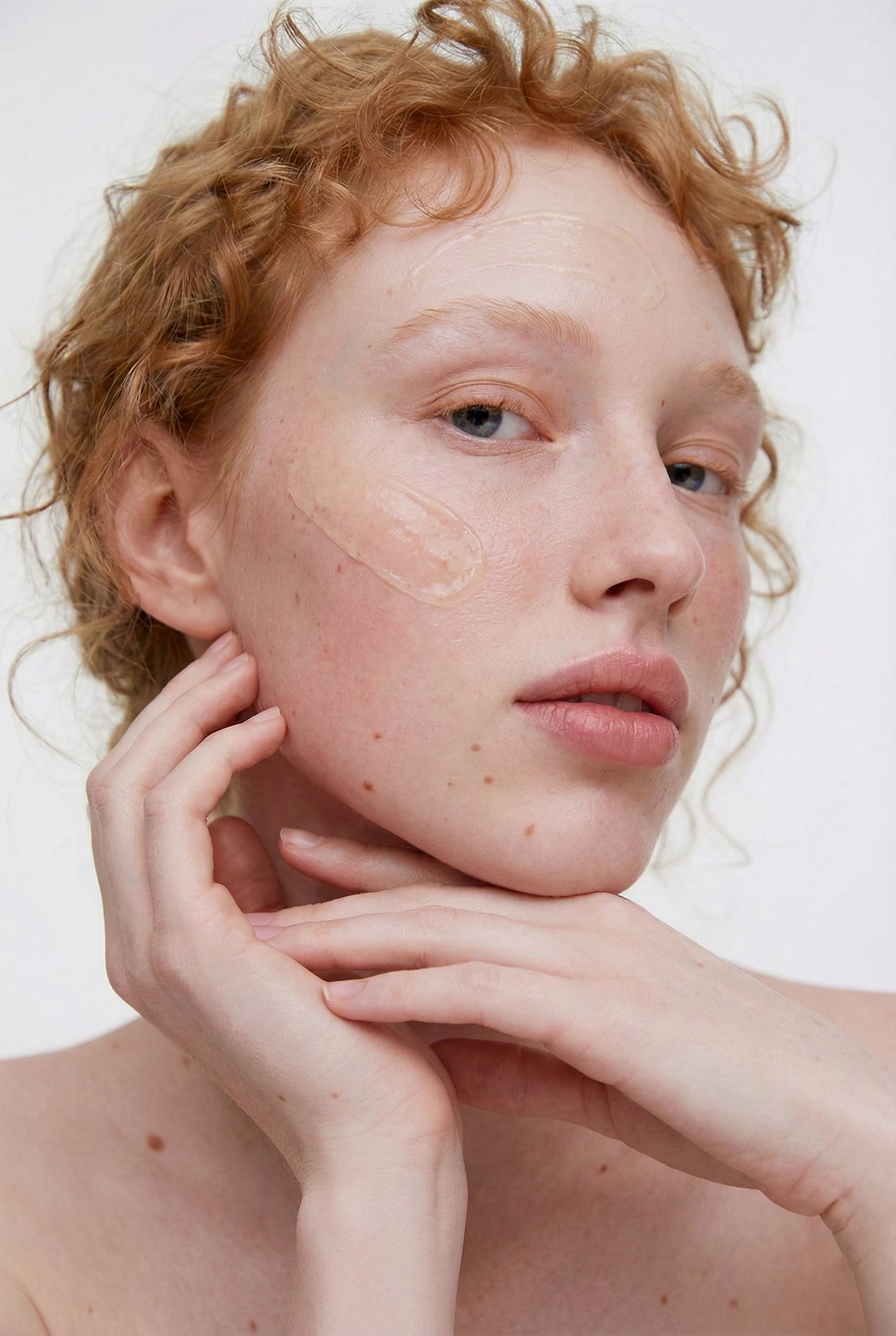 Serum texture applied to skin in close-up skincare application